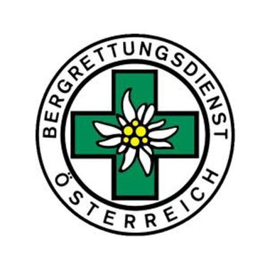 Ein Logo des Bergrettungsdienstes Österreich. Es zeigt ein grünes Kreuz mit einer Alpenblume in der Mitte. | © Bergrettung Mittelberg Hirschegg Logo