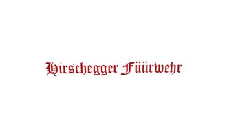 A sign with the inscription "Hirschegger Feuerwehr" in red letters. The letters are designed in a decorative font. | © Kleinwalsertal Tourismus | Feuerwehr Hirschegg