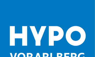 A simple, light blue logo with the inscription "HYPO VORARLBERG" in large white letters. The design is modern and minimalist.