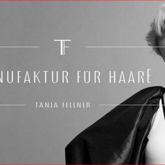 A modern black and white image featuring a woman wearing stylish clothing. The text "Manufaktur für Haare" and "Tanja Heilmer" are visible.