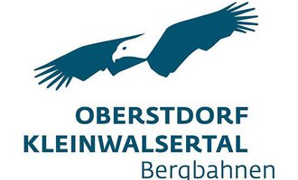 Ein Logo mit einem stilisierten Adler und dem Schriftzug "Oberstdorf Kleinwalsertal Bergbahnen". Es repräsentiert die Bergbahnen in der Region Oberstdorf und Kleinwalsertal. | © OBERSTDORF · KLEINWALSERTAL BERGBAHNEN