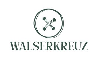 Ein einfaches Logo mit dem Schriftzug „WALSERKREUZ“. Darüber befindet sich ein kreisförmiges Symbol mit gekreuzten Elementen.